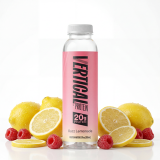 Vertical Protein Razz Lemonade bottle with lemons and raspberries on a white background